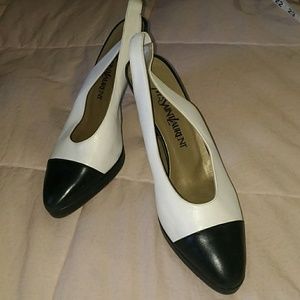 Yves Saint Laurent platform spectator pumps.
